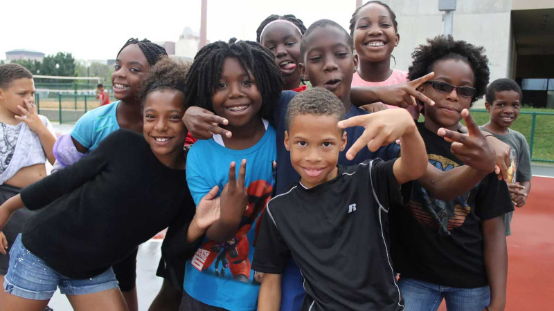 Group photo showing Peace signs